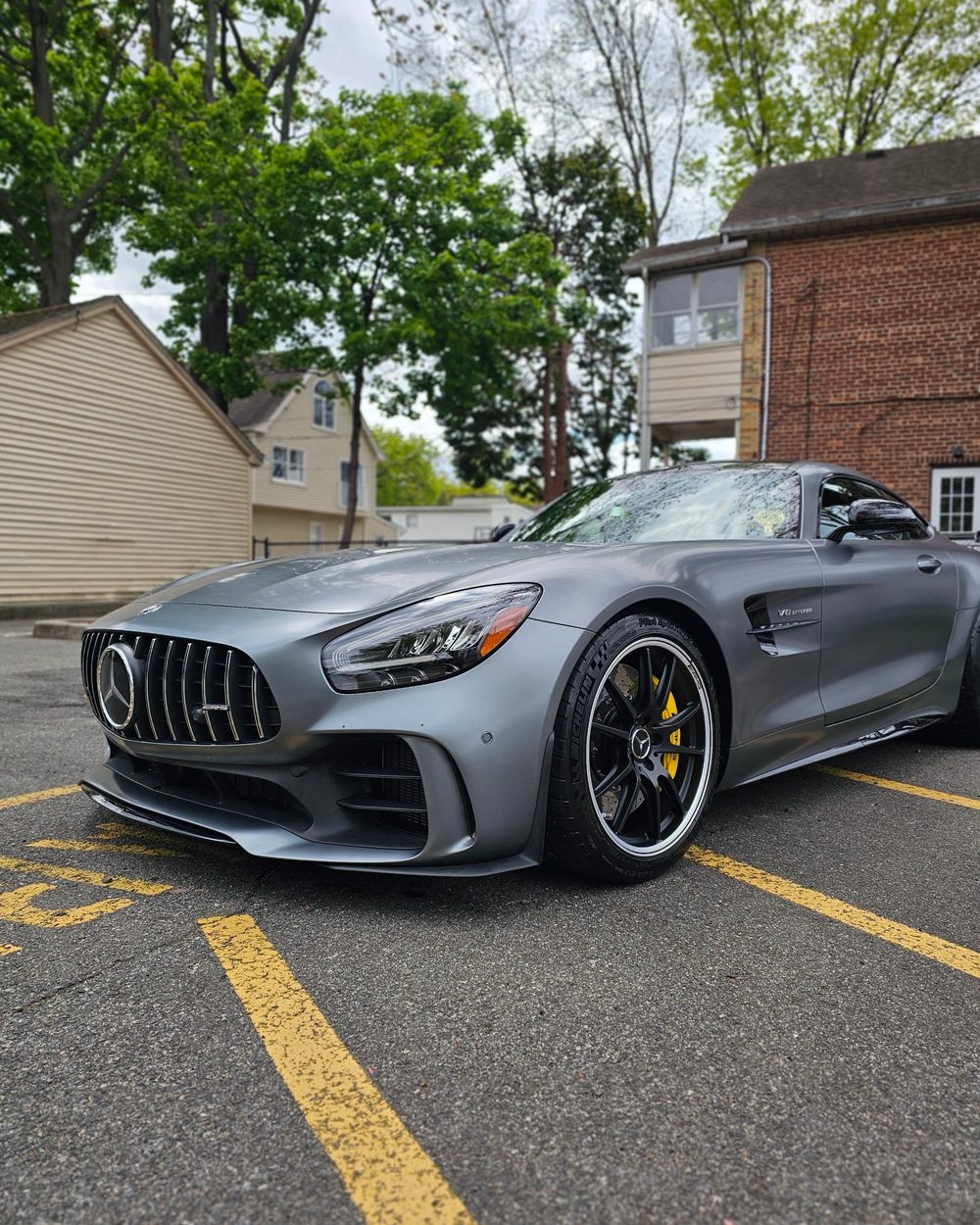 Matte grey Mercedes-AMG GT with yellow brake calipers